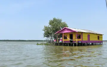Wooden homes above the water in Nueva Venecia
